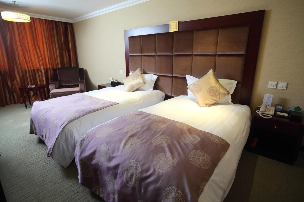 Qingdao Sanfod Hotel Rom bilde